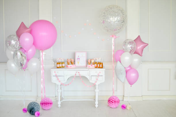 istock Birthday decorations. Balloons pink and white. 1003383854
