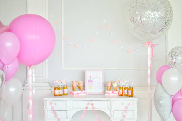 istock Birthday decorations. Balloons pink and white. 1003384200
