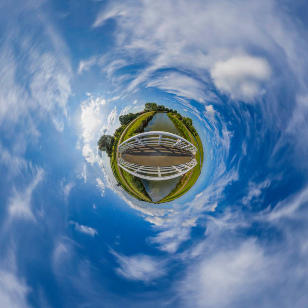 360 degrees spherical panoramic shot of the old antique windmill against a cloudy sky; South Holland