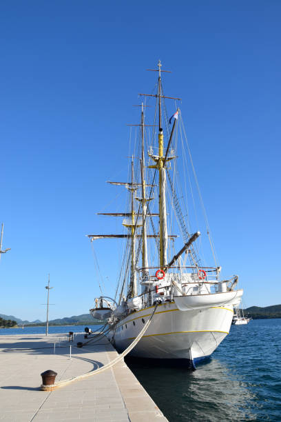 istock Look at the boats from the dock in the harbor 1003396164