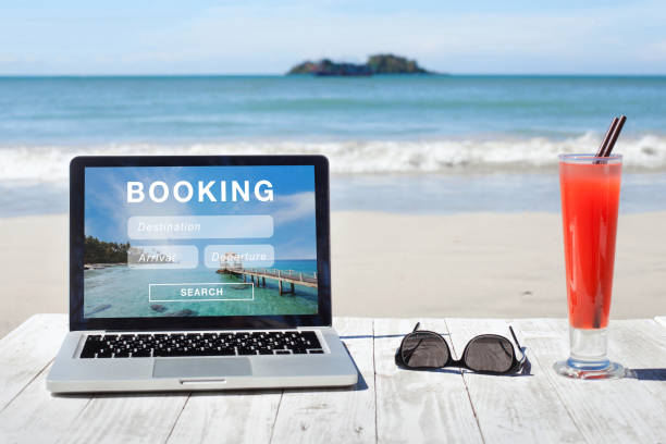 travel booking, hotels and flights reservation on internet travel booking, hotels and flights reservation on the screen of computer dealing cards stock pictures, royalty-free photos & images