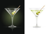 Martini glass. Cocktail with olive.