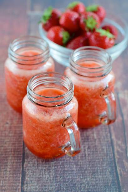 istock Fresh strawberry juice in jars 1003415714