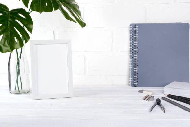 istock Minimalistic school or office workspace with gray stationery on white background. Education concept. Back to school. 1003417514