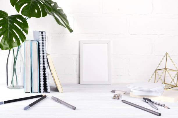 istock Minimalistic school or office workspace with gray stationery on white background. Education concept. Back to school. 1003417662