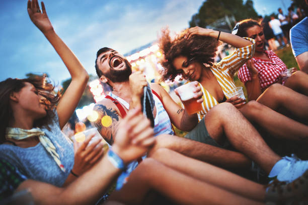 istock Friends dancing at a concert. 1003421458