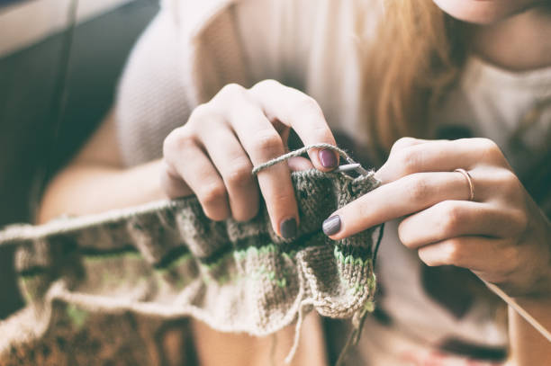 istock Woman knitting an Icelandic pattern 1003427068