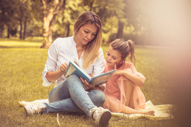 istock Education in nature. Mother and daughter. 1003432006