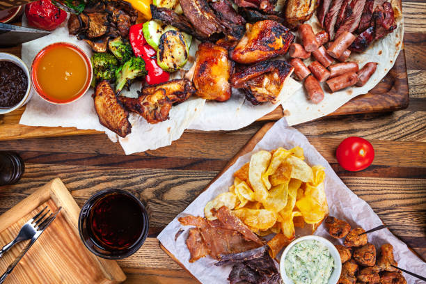 istock Grilled assorted food set on wooden background. 1003433266
