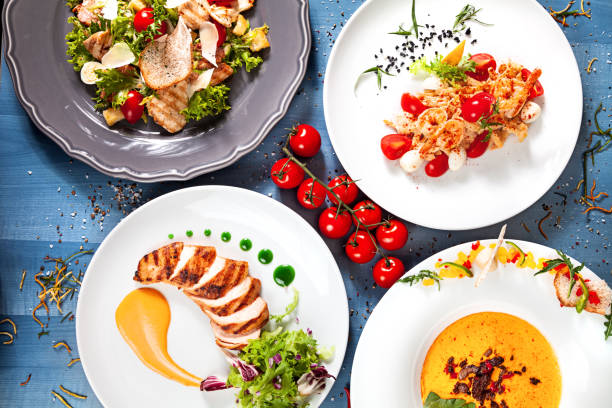 istock Assorted European food on a bright blue background. 1003433302