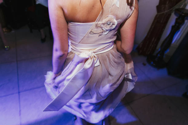 istock guests having fun and dancing at wedding reception. holiday celebrations.  people dance at party in restaurant 1003455012