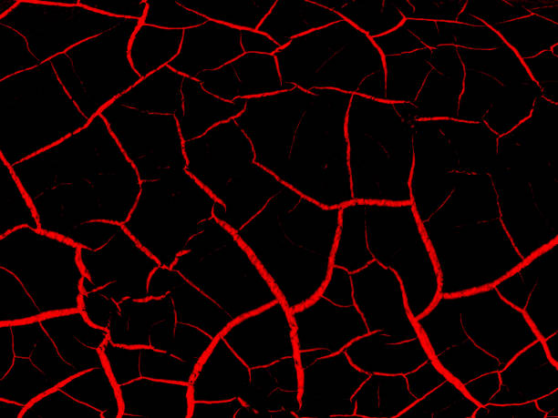 istock Texture of red cracks on black background 1003458648