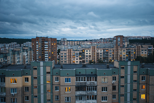 Aerial view of town with old socialist soviet panel building (plattenbau) at evening. The buildings were built in the Soviet Union (now Ukraine). The architecture looks like most post-soviet commuter towns.