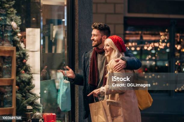 Couple Doing Some Window Shopping Stock Photo - Download Image Now - Shopping, Retail, Christmas