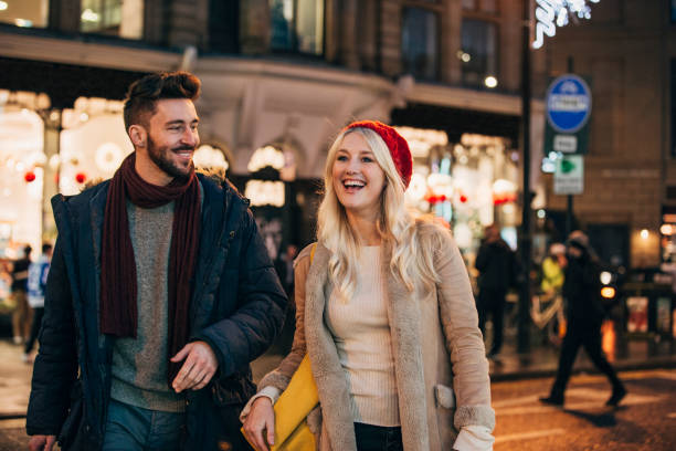 istock Couple Enjoying the Christmas Sales 1003490018