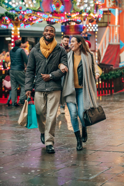 istock Happy Couple Walking Arm in Arm 1003490716
