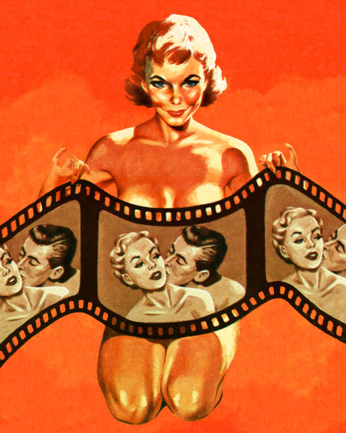istock Naked Woman Holding a Filmstrip 1003490732