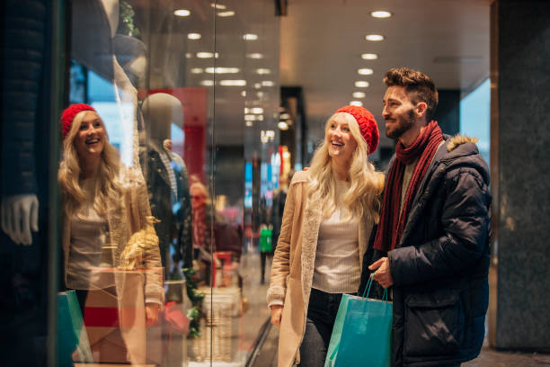 istock Couple Window Shopping Together 1003490928