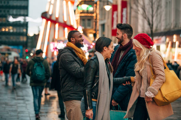 Two Couples Meeting on a City Street