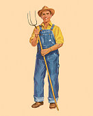 istock Farmer Holding a Pitchfork 1003493824