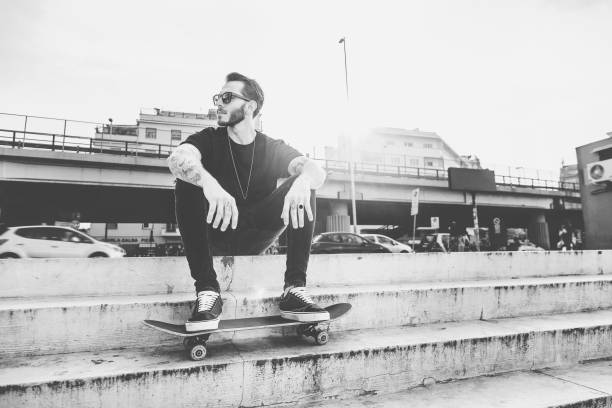 istock Young Men with his skateboard moving in the city 1003536188