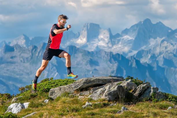 istock A skyrunner athlete man trains in the high mountains 1003539122