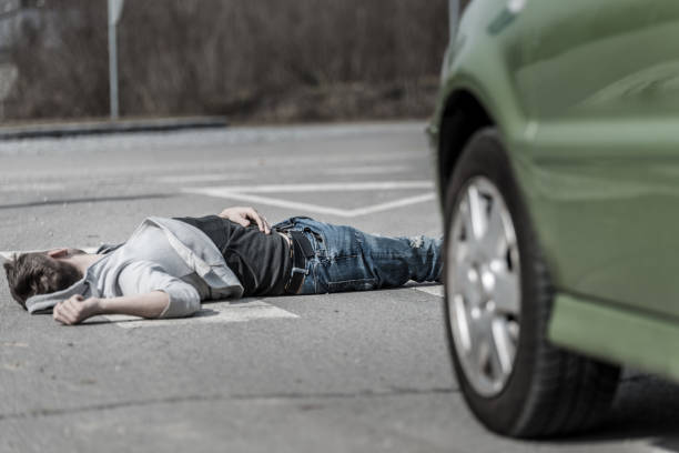 istock Traffic accident.Young man hit by a car 1003545554