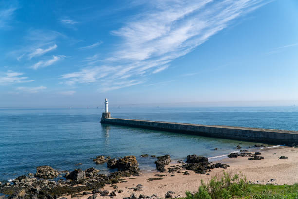 Phare sur la jetée sud, port Aberdeen, en Écosse. - Photo