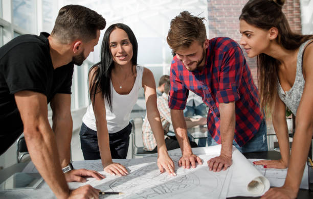 istock close up.business team discussing the design of an architectural project 1003578320