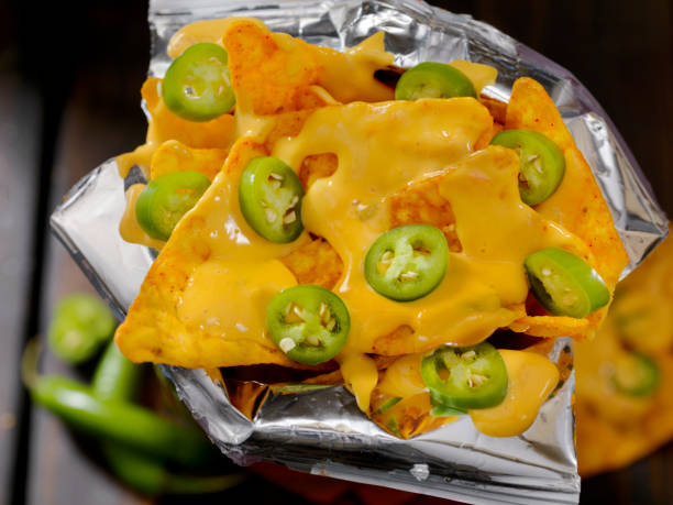 istock Nacho Cheese Tortilla Chips in a bag 1003580034