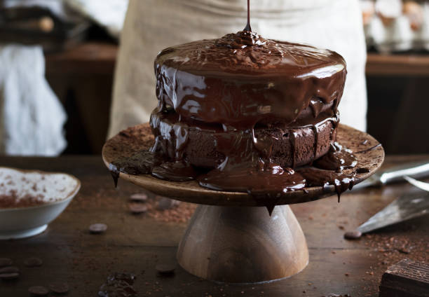 チョコレート ケーキ食品写真レシピ アイデア - chocolate topping ストックフォトと画像