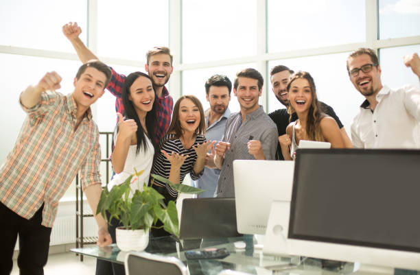istock young business team is unpacking boxes in a new office 1003583892