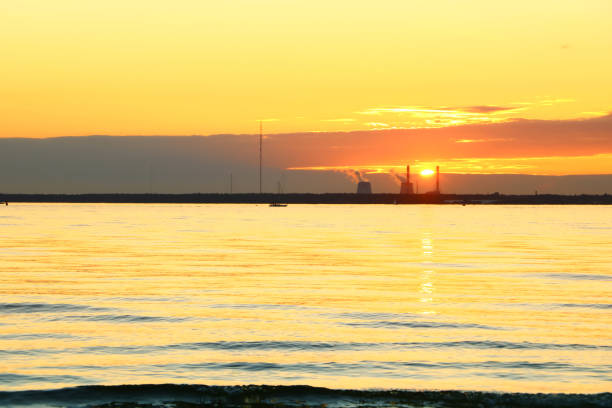 istock beautiful sunset on the coast sea 1003584790