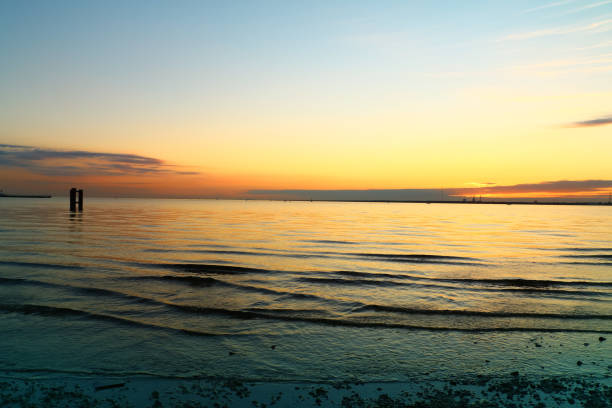 istock beautiful sunset on the coast sea 1003584846