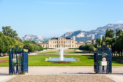 Marseille, France - May 23, 2018: The Borely castle, a large mansion with french formal garden located in the Borely park, houses the Museum of Decorative Arts, Faience and Fashion since 2013.