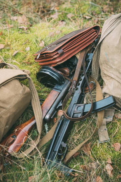 istock Old Soviet Russian Red Army Submachine Gun PPS-43 Of World War II Lying In Grass 1003587236