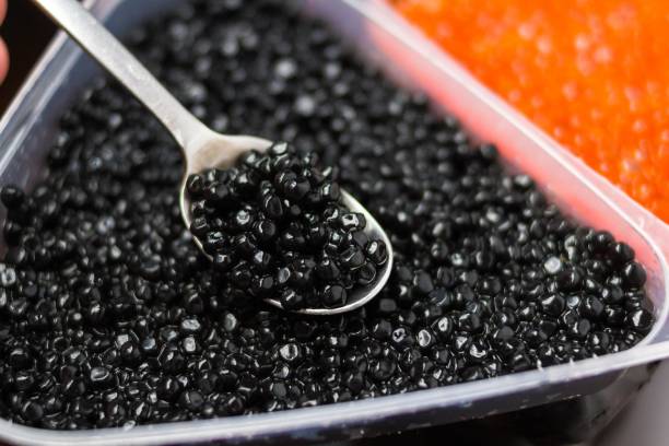 istock black caviar of sturgeon. 1003587280