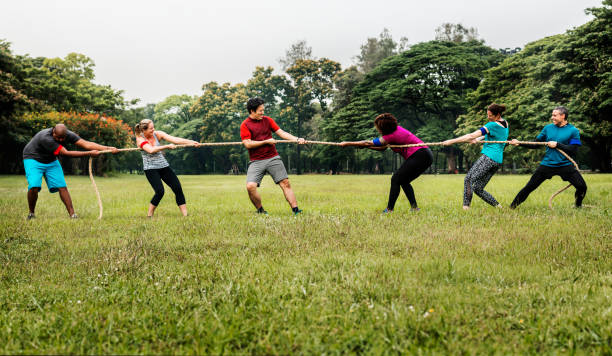 Team competing in tug of war
