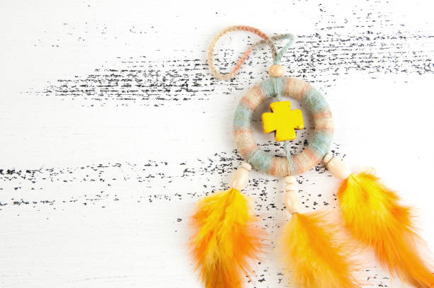 istock Bright dream catcher with yellow cross 1003587844