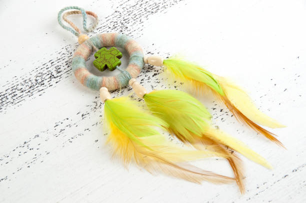 istock Bright dream catcher with a green cross 1003588062