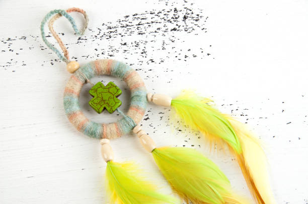 istock Bright dream catcher with green cross 1003588288