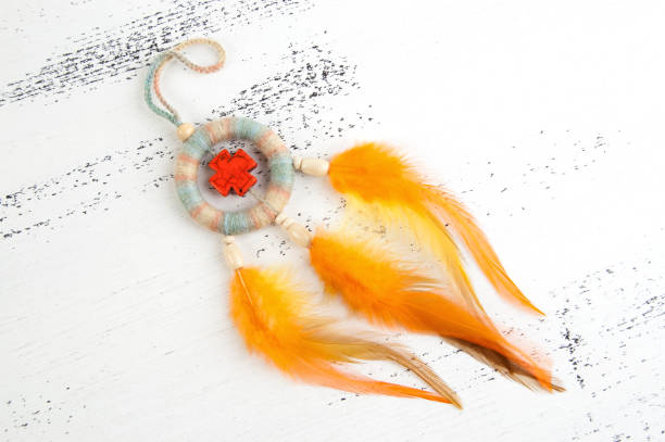istock Bright dream catcher with an orange cross 1003588878