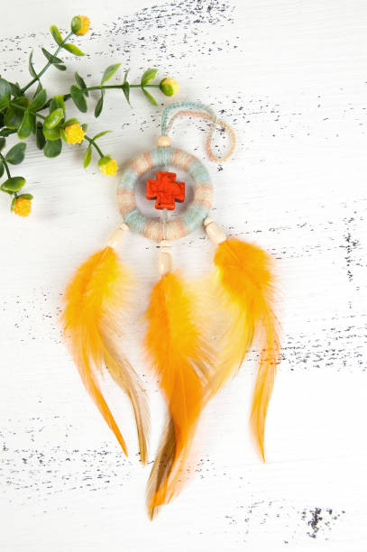 istock Bright dream catcher with an orange cross 1003589260
