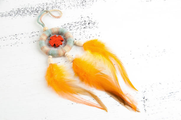 istock Bright dream catcher with an orange cross 1003589844