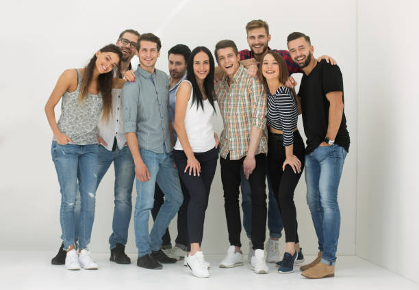 istock creative business team standing near the wal 1003593570