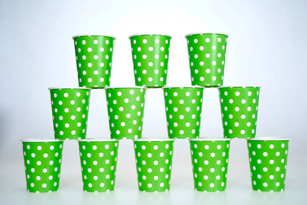 green plastic wine cup on white background