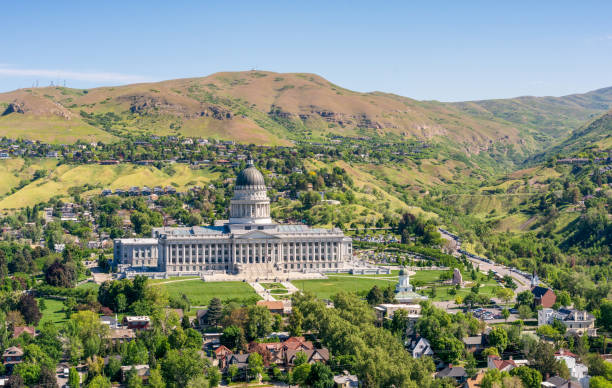 Utah State Capitol in Salt Lake City A high angle view of Utah's State Capitol building, flanked by mountains, in the north of Salt Lake City, Utah. salt lake county stock pictures, royalty-free photos & images