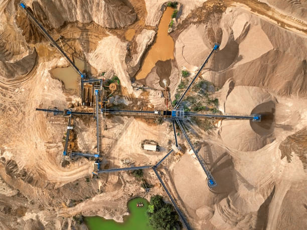 istock Aerial view of crushed stone quarry machine 1003597688