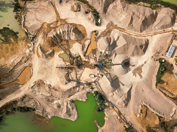 istock Aerial view of crushed stone quarry machine 1003597722