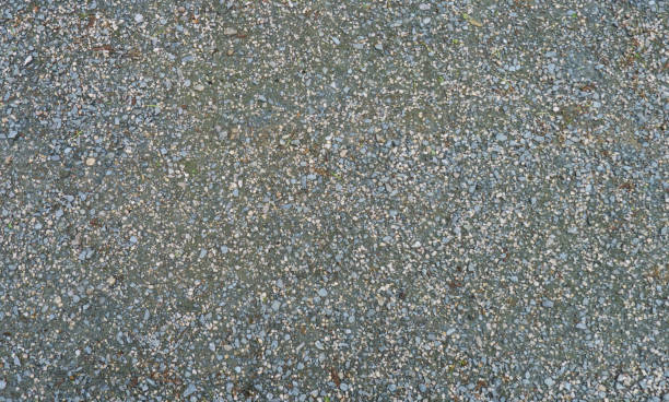 istock gravel road background in park 1003602884